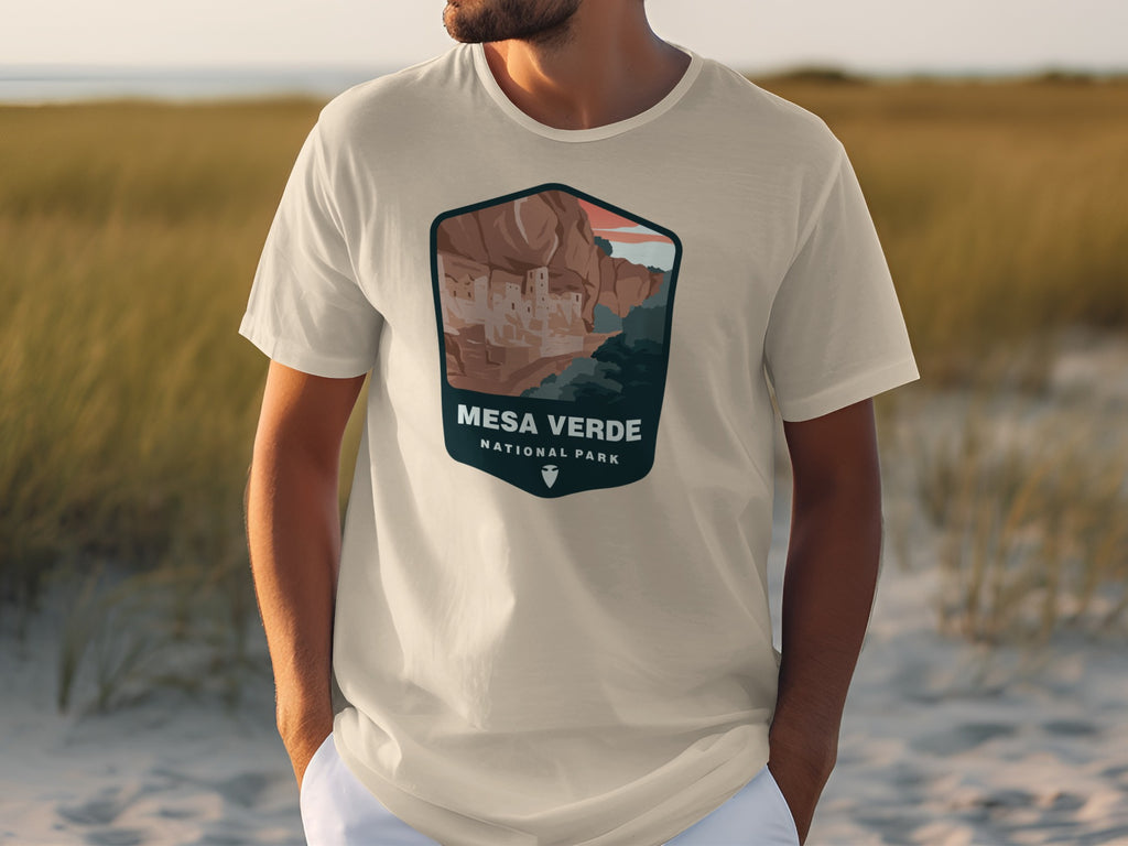 T-shirt with Mesa Verde National Park graphic featuring cliff dwellings and mountains.