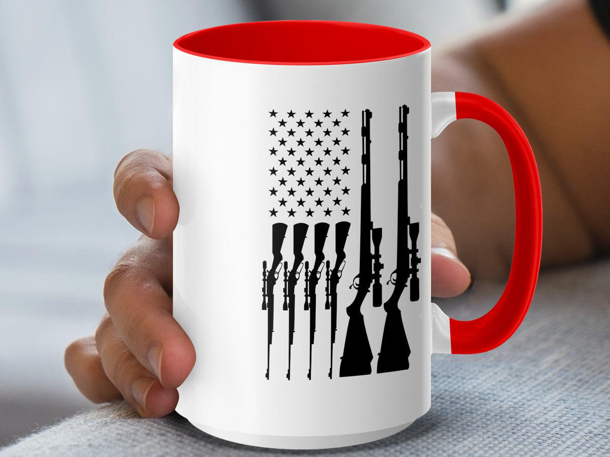 White mug with red handle, featuring an American flag design made of rifle silhouettes.