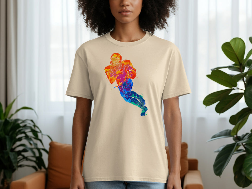 Cream t-shirt with a colorful watercolor football player design.
