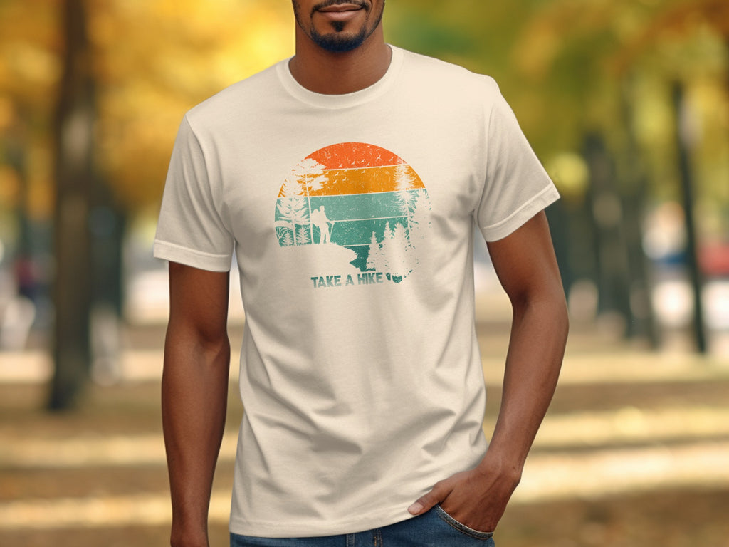T-shirt with retro sunset graphic and "TAKE A HIKE" text.