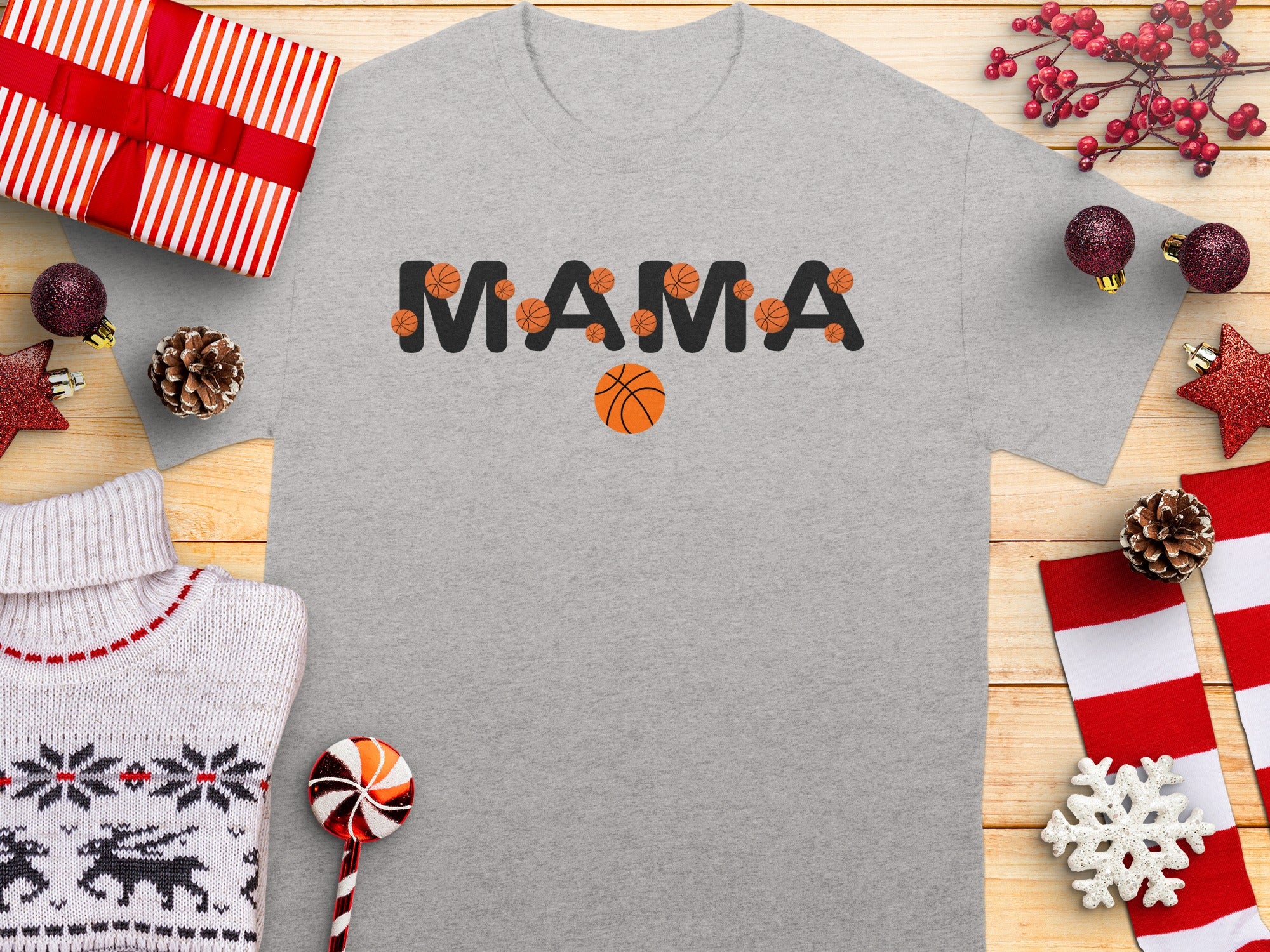 Grey t-shirt with "Mama" text and basketball graphics, surrounded by gifts and holiday decorations.