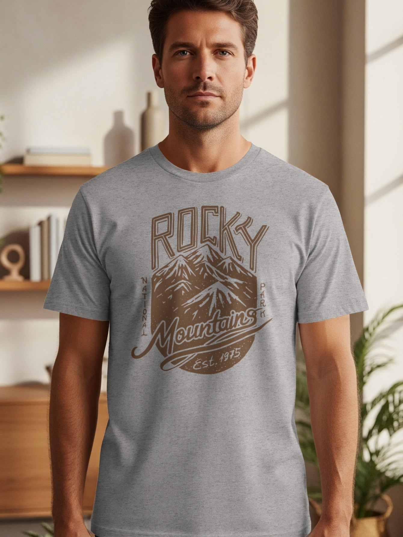 Grey t-shirt with Rocky Mountains National Park Est. 1975 graphic.