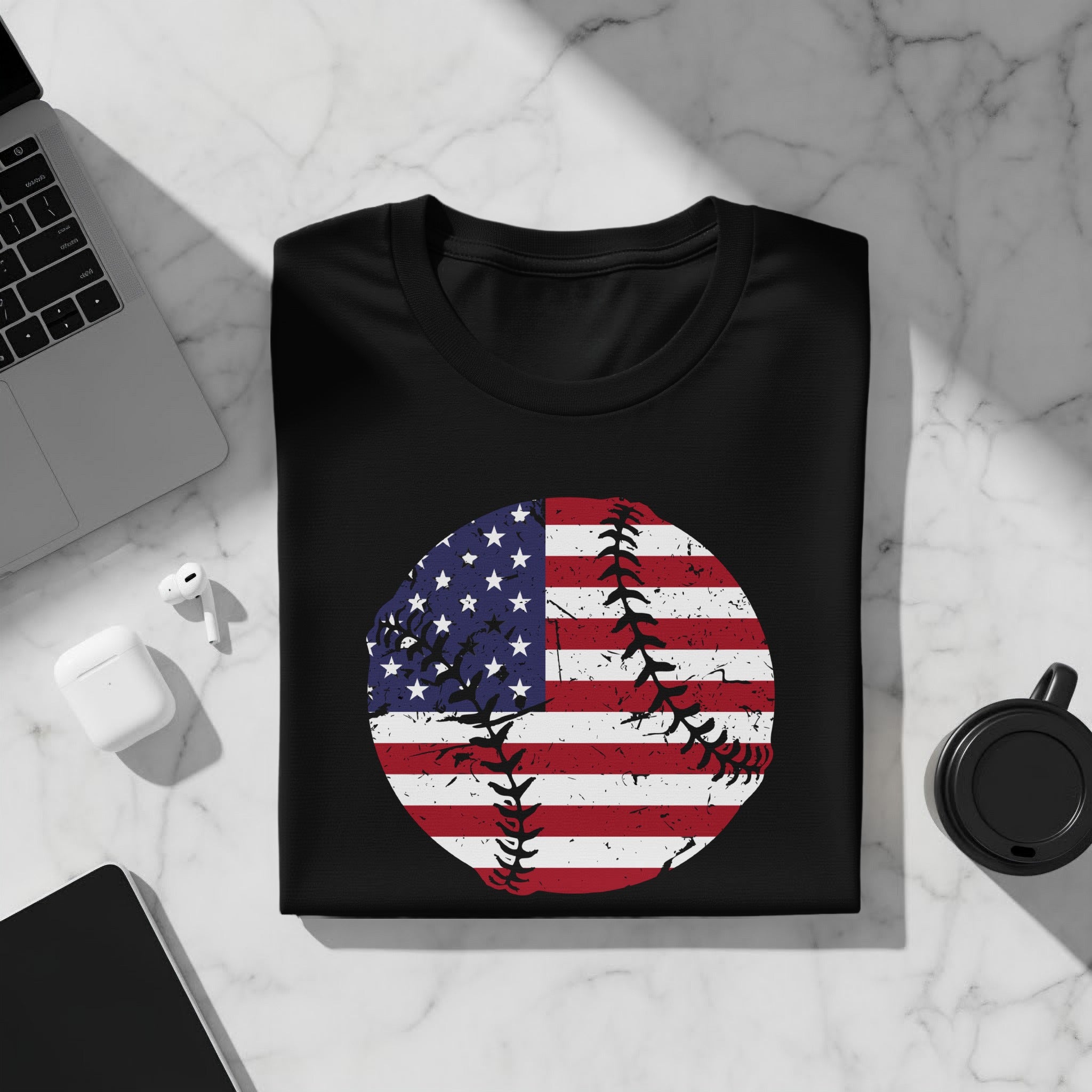 Black t-shirt with distressed American flag baseball graphic.