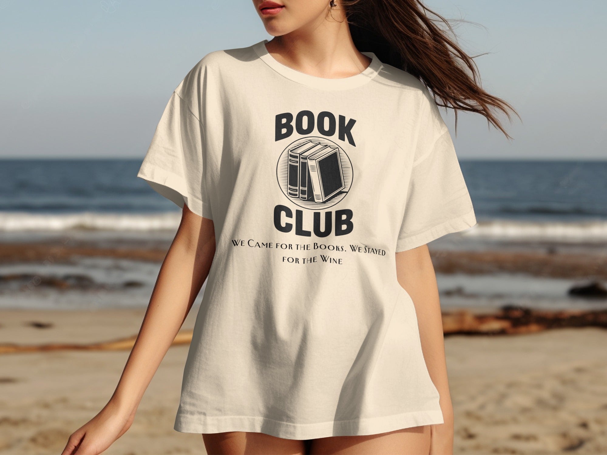 Cream t-shirt with "BOOK CLUB" text and books graphic, "We Came for the Books. We Stayed for the Wine."