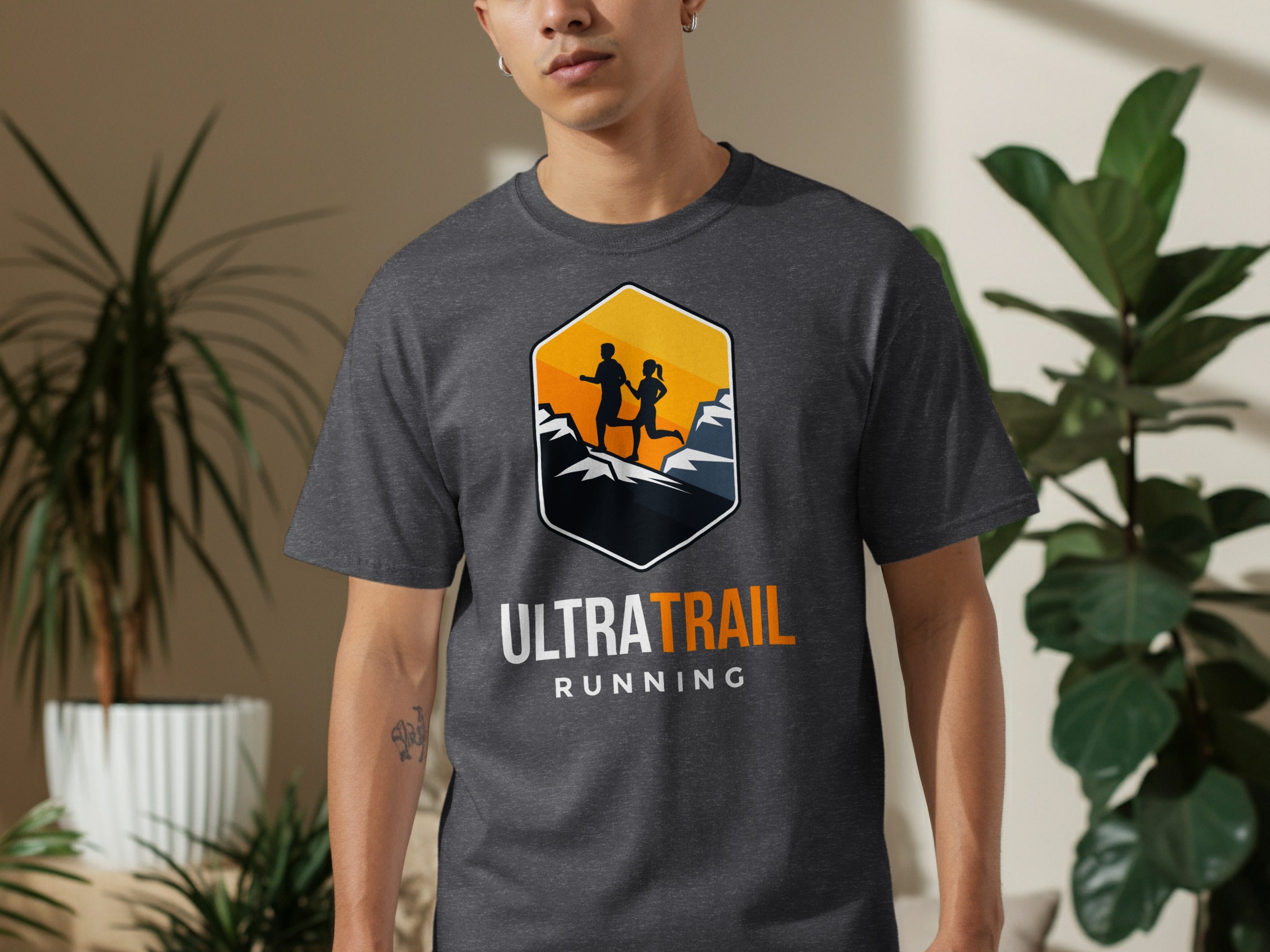 Dark grey t-shirt with hexagonal Ultra Trail Running logo featuring runners on mountains.