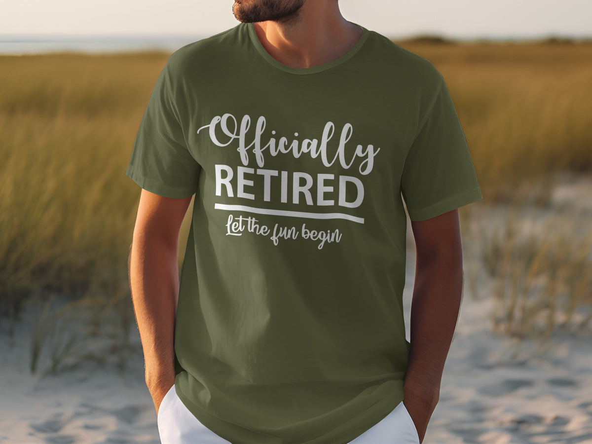 Olive green t-shirt with white text that reads "Officially RETIRED let the fun begin."