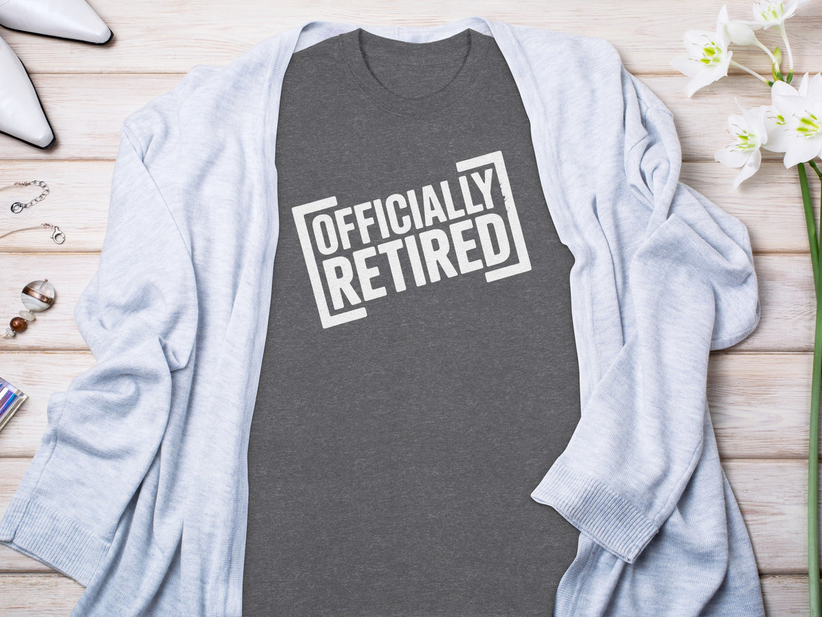 Dark grey t-shirt with "OFFICIALLY RETIRED" text in a white box.