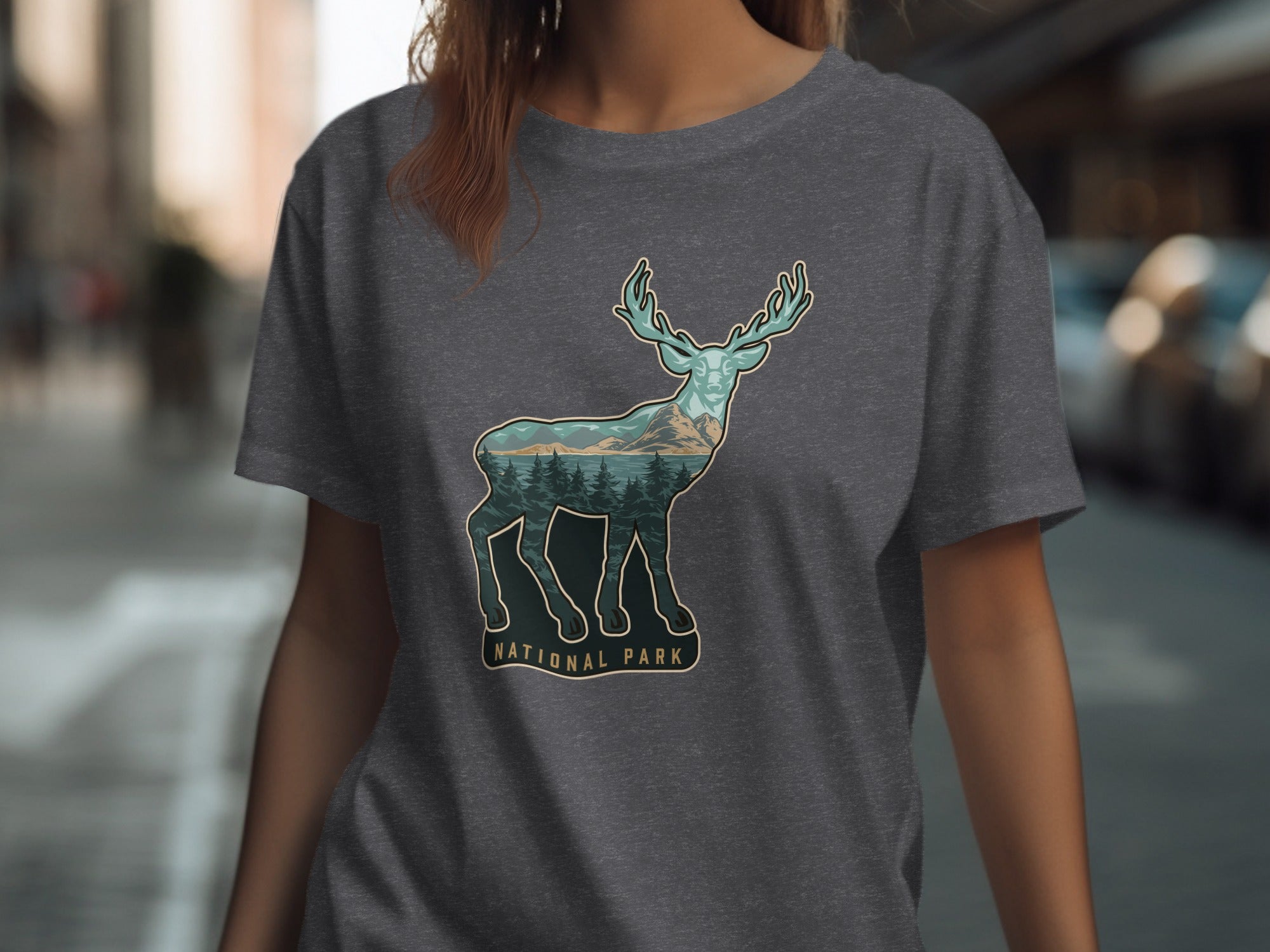 Deer graphic with mountain and forest landscape inside, text "NATIONAL PARK".
