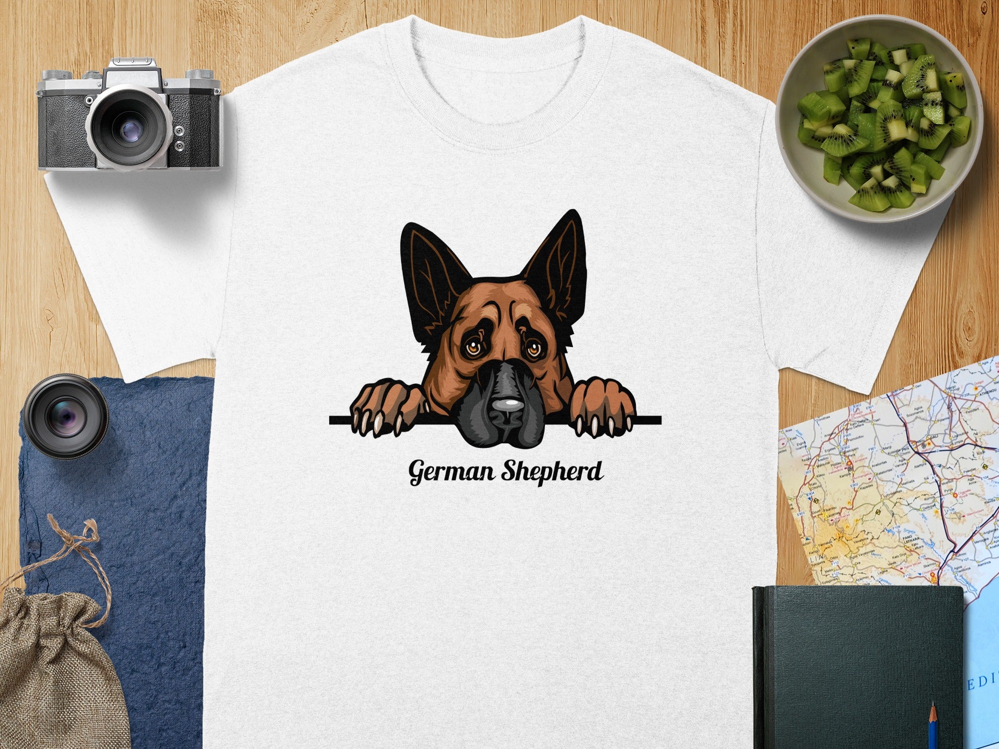 White t-shirt with a German Shepherd illustration peeking over a ledge.