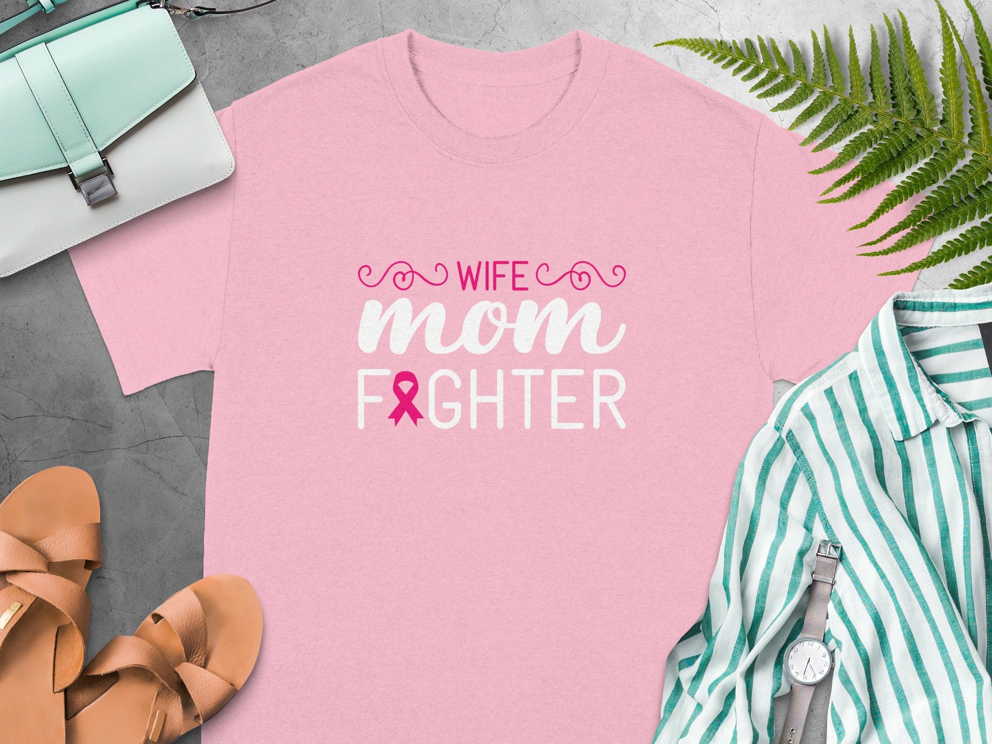 Pink t-shirt with text "Wife Mom Fighter" and a pink ribbon.