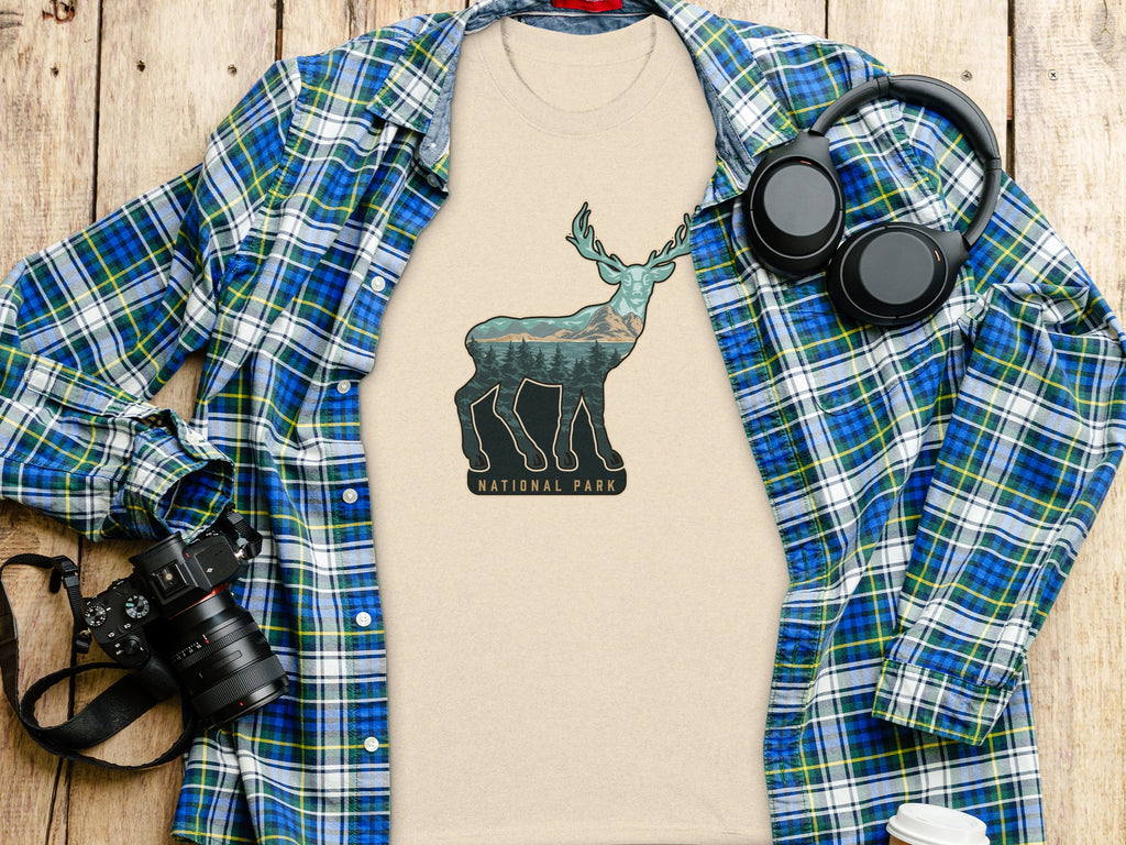 T-shirt with deer graphic: National Park text and nature scene inside.