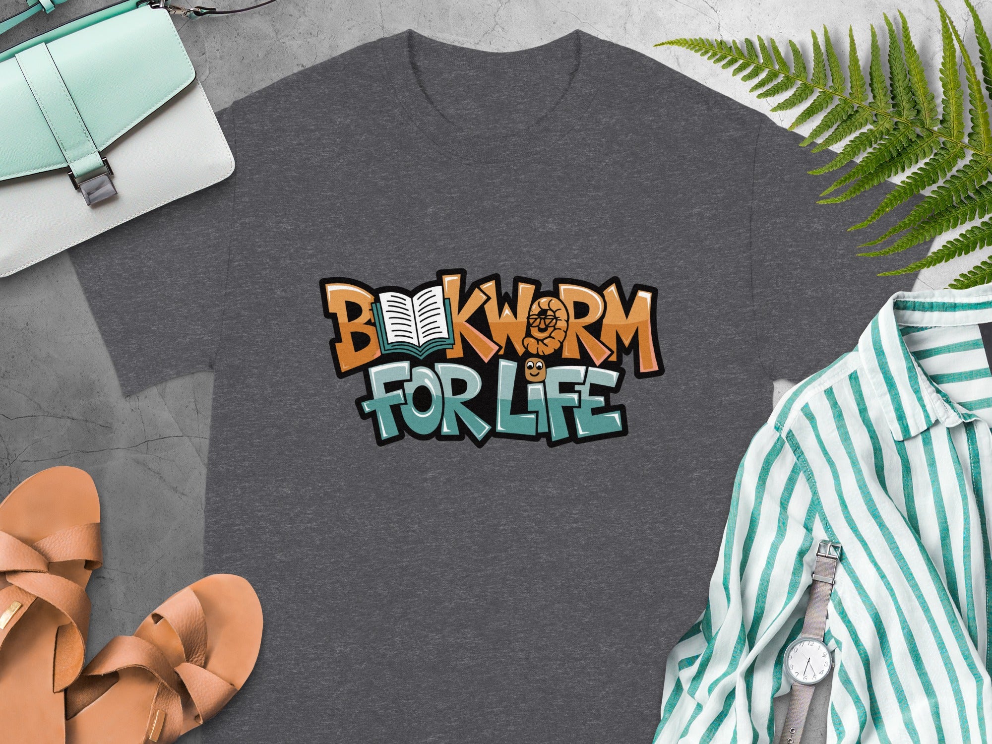 Dark grey t-shirt with "BOOKWORM FOR LIFE" graphic featuring a worm and book.