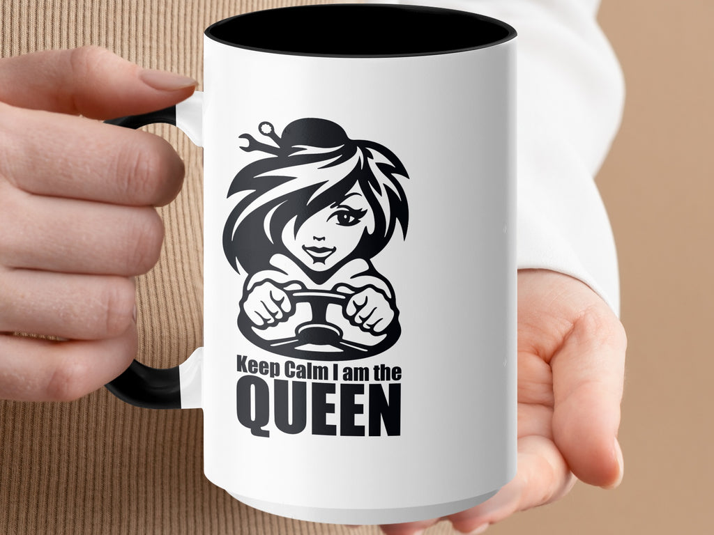 White mug with black interior featuring a cartoon woman driving, text says "Keep Calm I am the QUEEN".