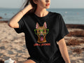 Black t-shirt with illustration of dog in glasses and text "GEEK IS CHIC".