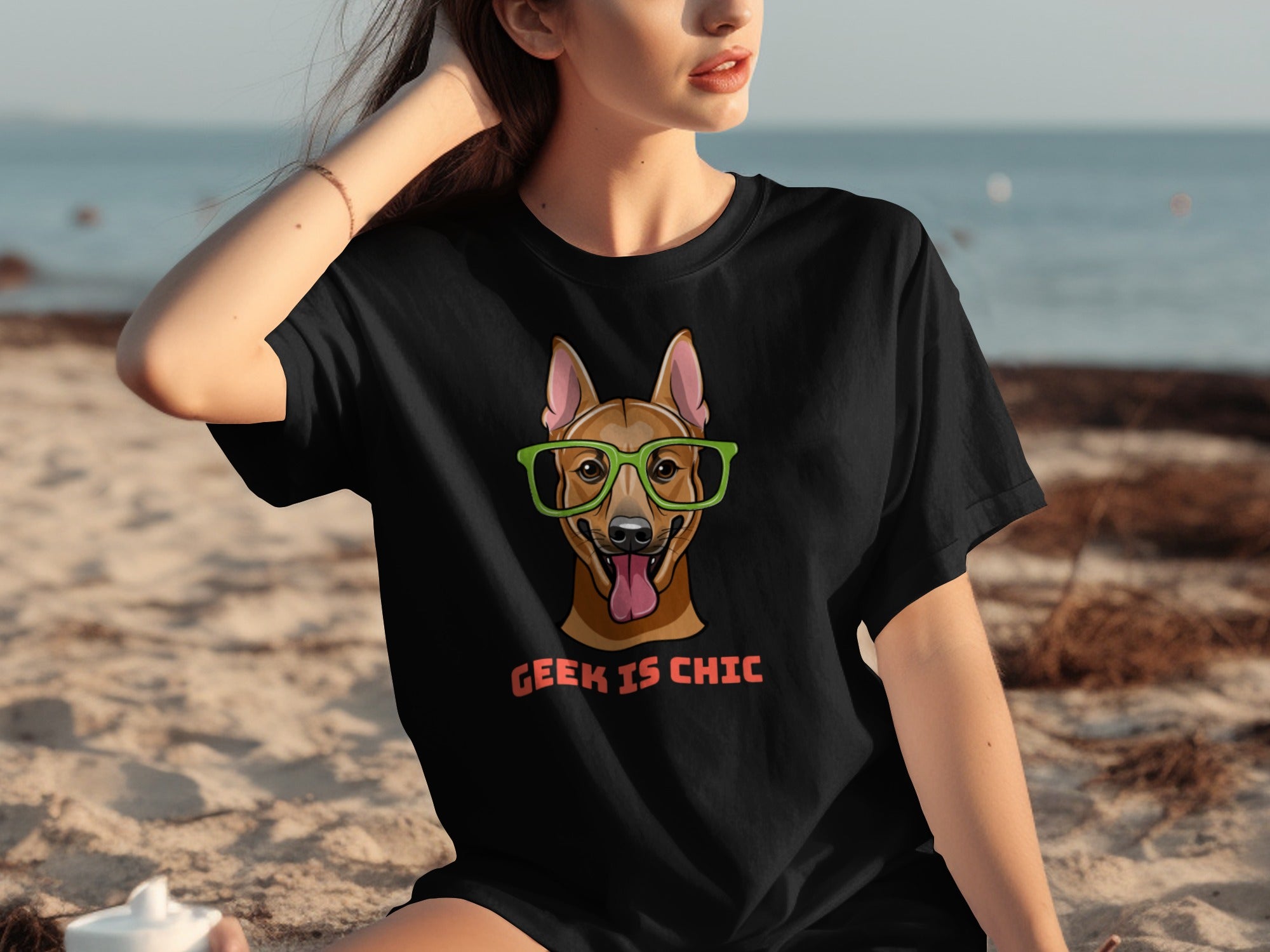 Black t-shirt with illustration of dog in glasses and text "GEEK IS CHIC".