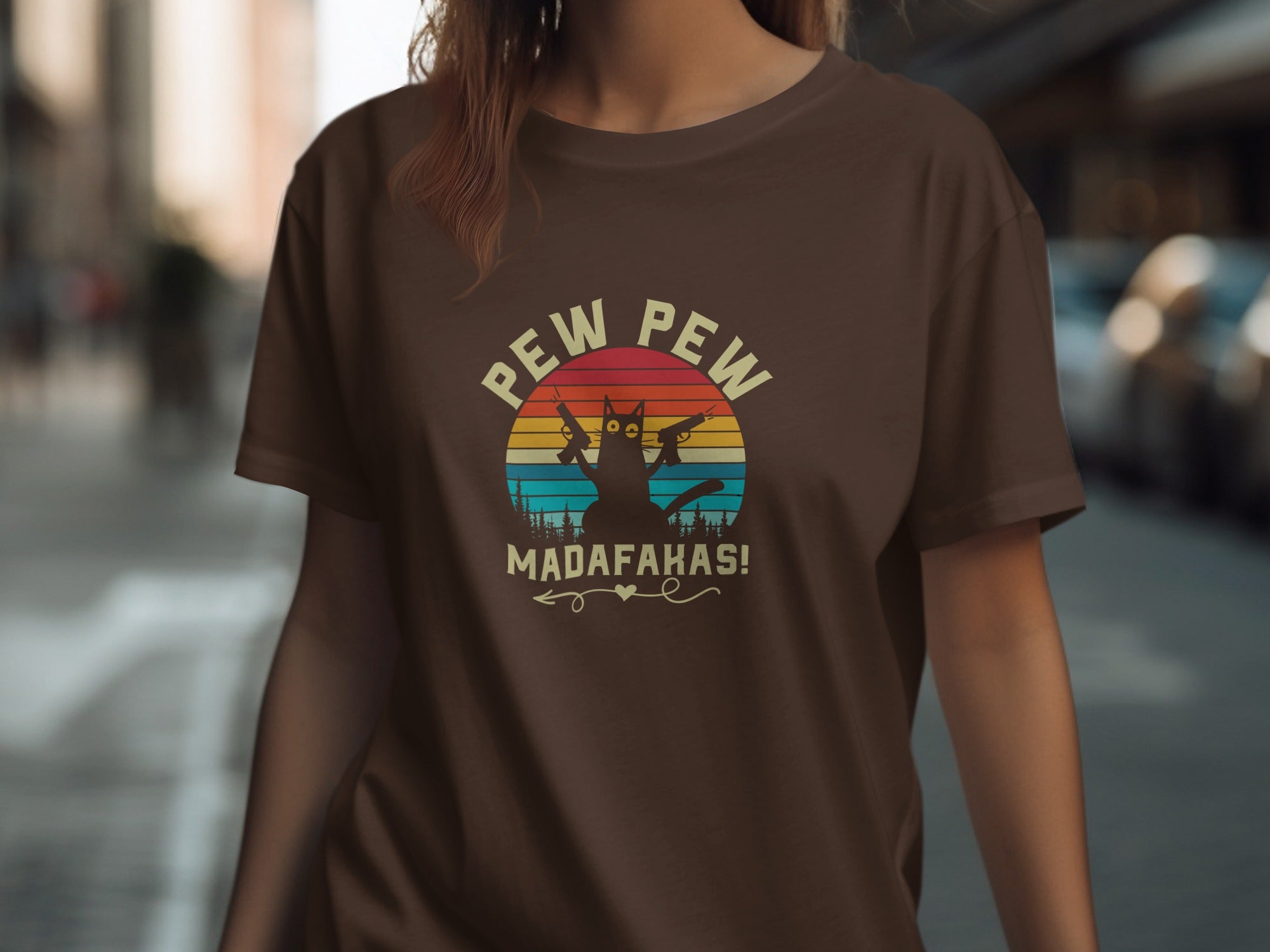 Brown t-shirt with a silhouetted cat holding guns above "PEW PEW MADAFAKAS!".