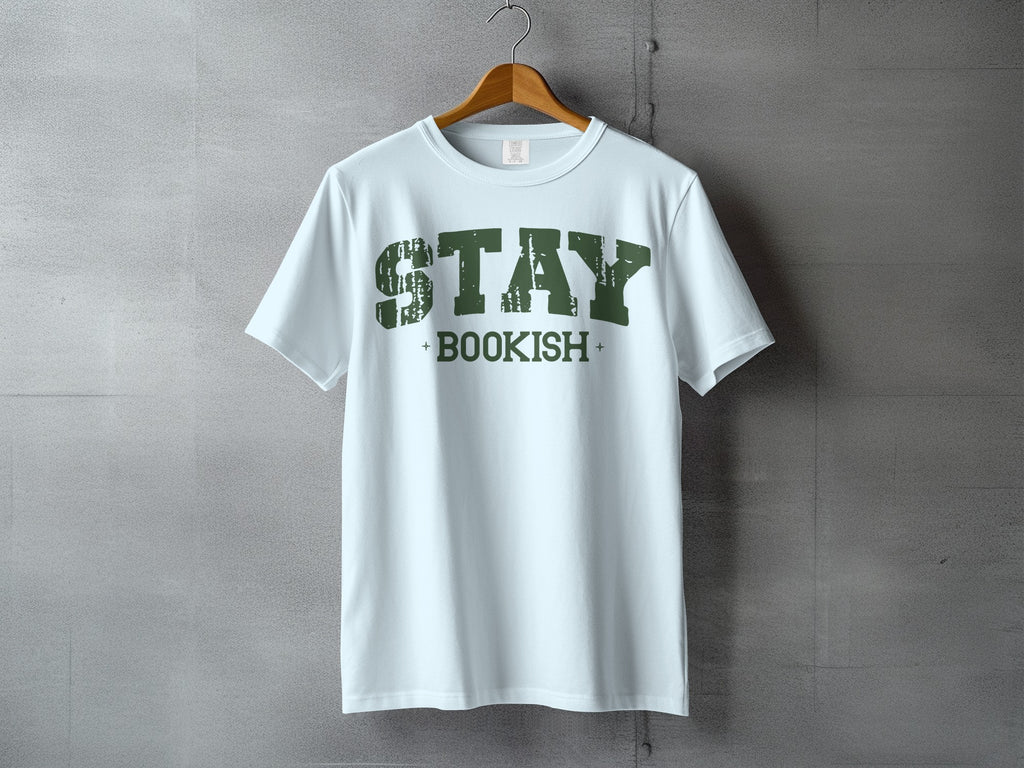 Light blue t-shirt with distressed green text reading "STAY BOOKISH".