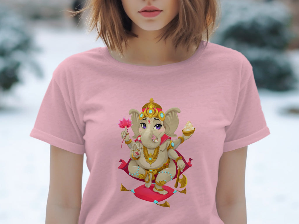 Pink t-shirt with cartoon Ganesha holding a lotus and sweet treats.
