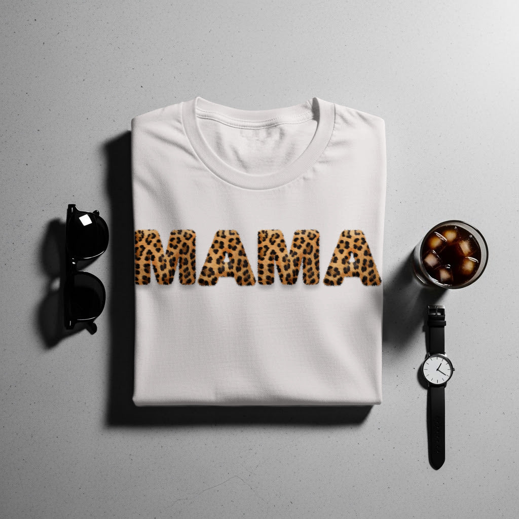 White t-shirt with "MAMA" in leopard print letters.