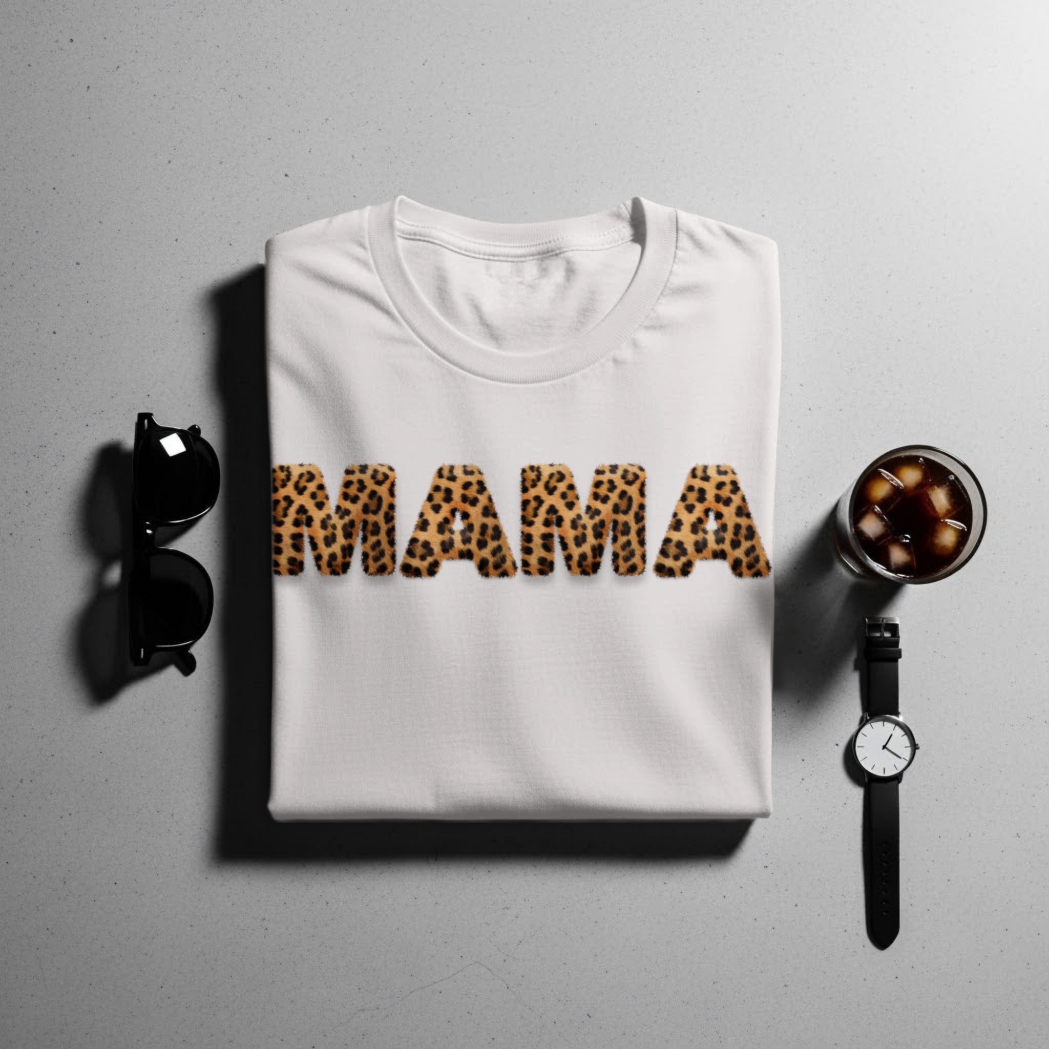 White t-shirt with "MAMA" in leopard print letters.