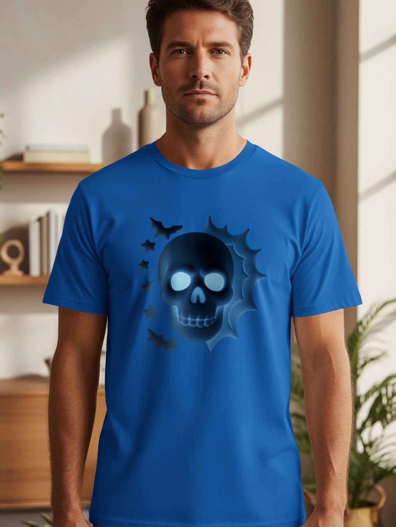 Blue t-shirt with a glowing skull and bats graphic.