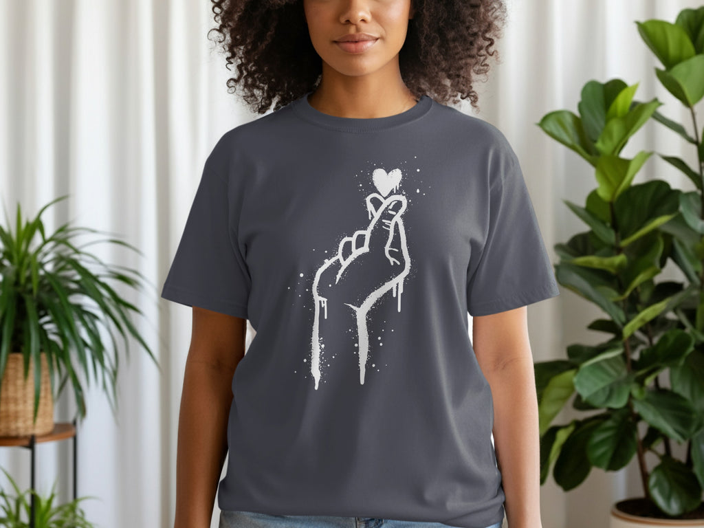 Dark grey t-shirt with white spray paint hand making heart gesture graphic