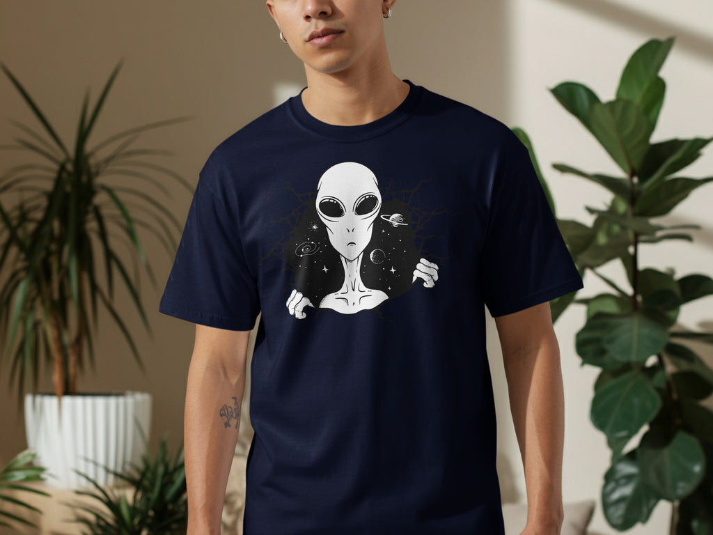 Navy t-shirt with a white alien bursting through a cracked space background.
