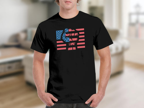 Black t-shirt with graphic of raised fist and American flag design.