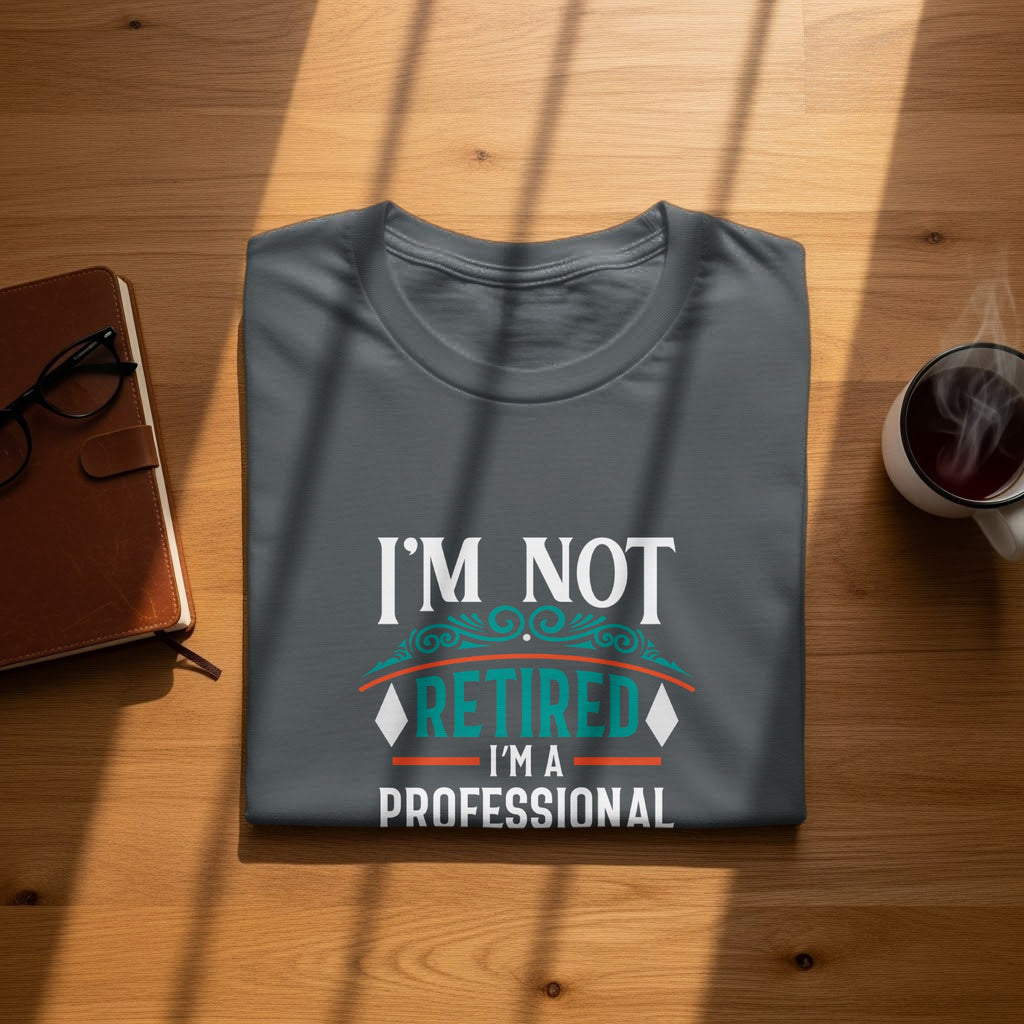 Dark gray t-shirt with "I'M NOT RETIRED I'M A PROFESSIONAL" graphic.