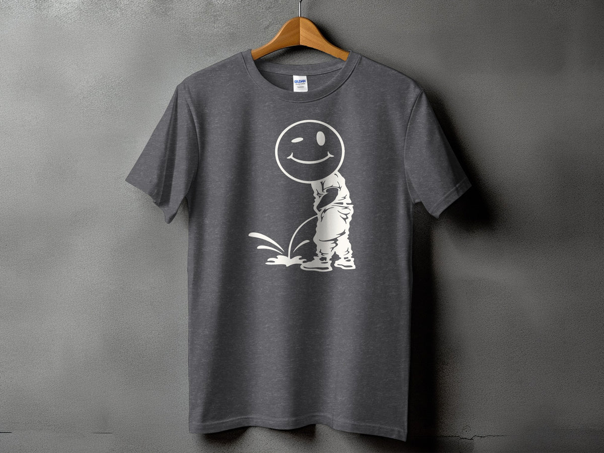 Dark gray t-shirt with a white graphic of a winking smiley face character urinating.