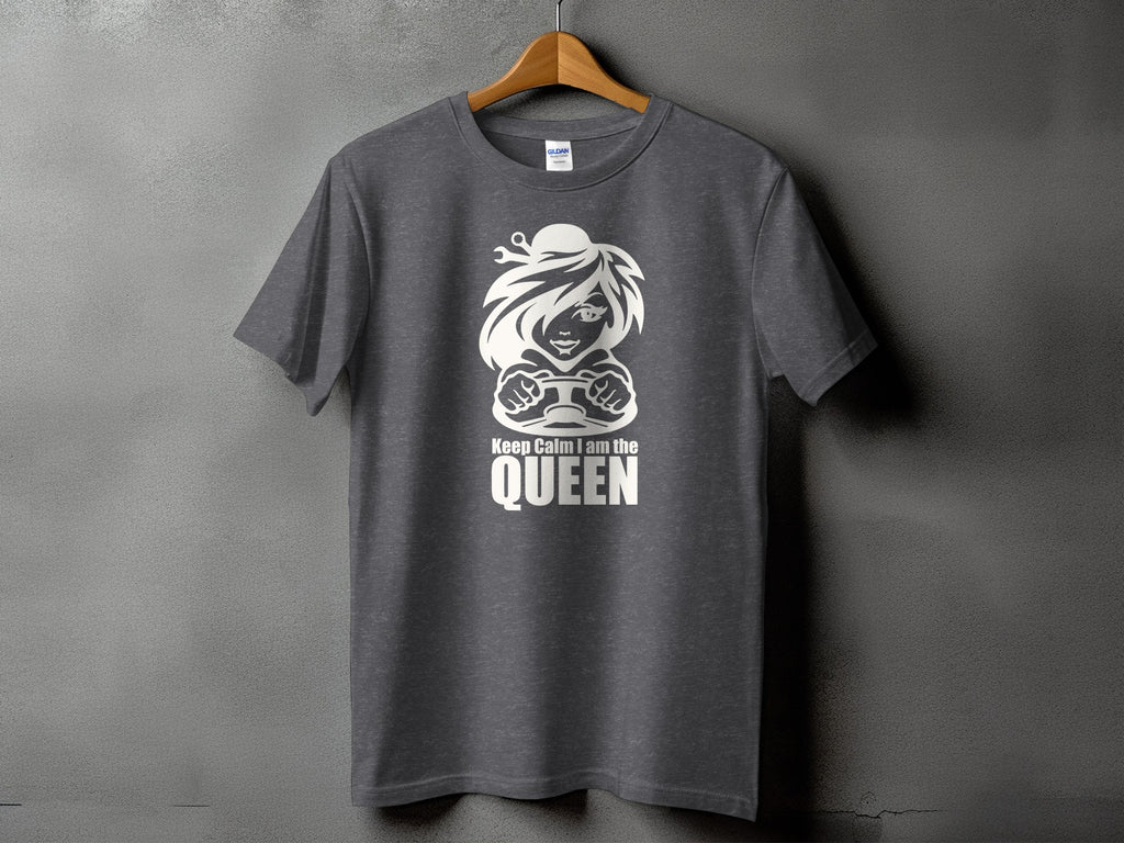 Dark grey t-shirt with white graphic of a woman driving and text "Keep Calm I am the QUEEN".