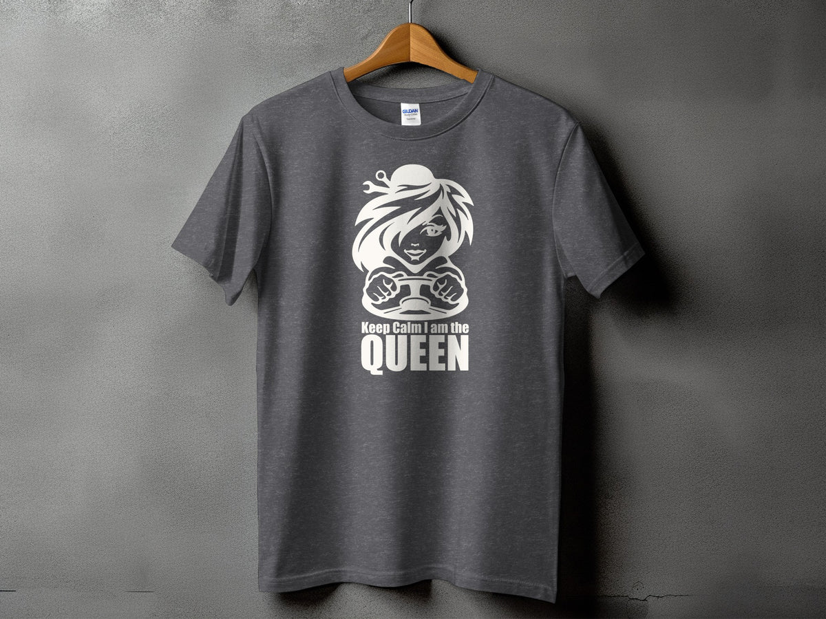 Dark grey t-shirt with white graphic of a woman driving and text "Keep Calm I am the QUEEN".
