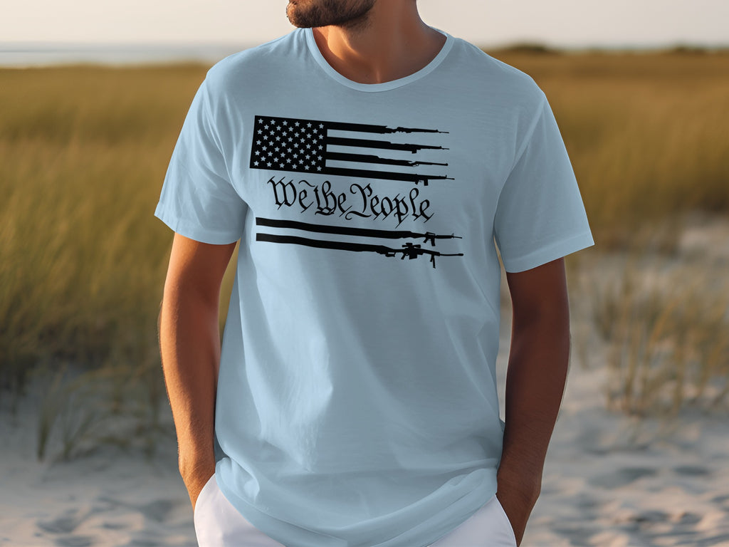 Light blue t-shirt with American flag graphic and "We the People" text.
