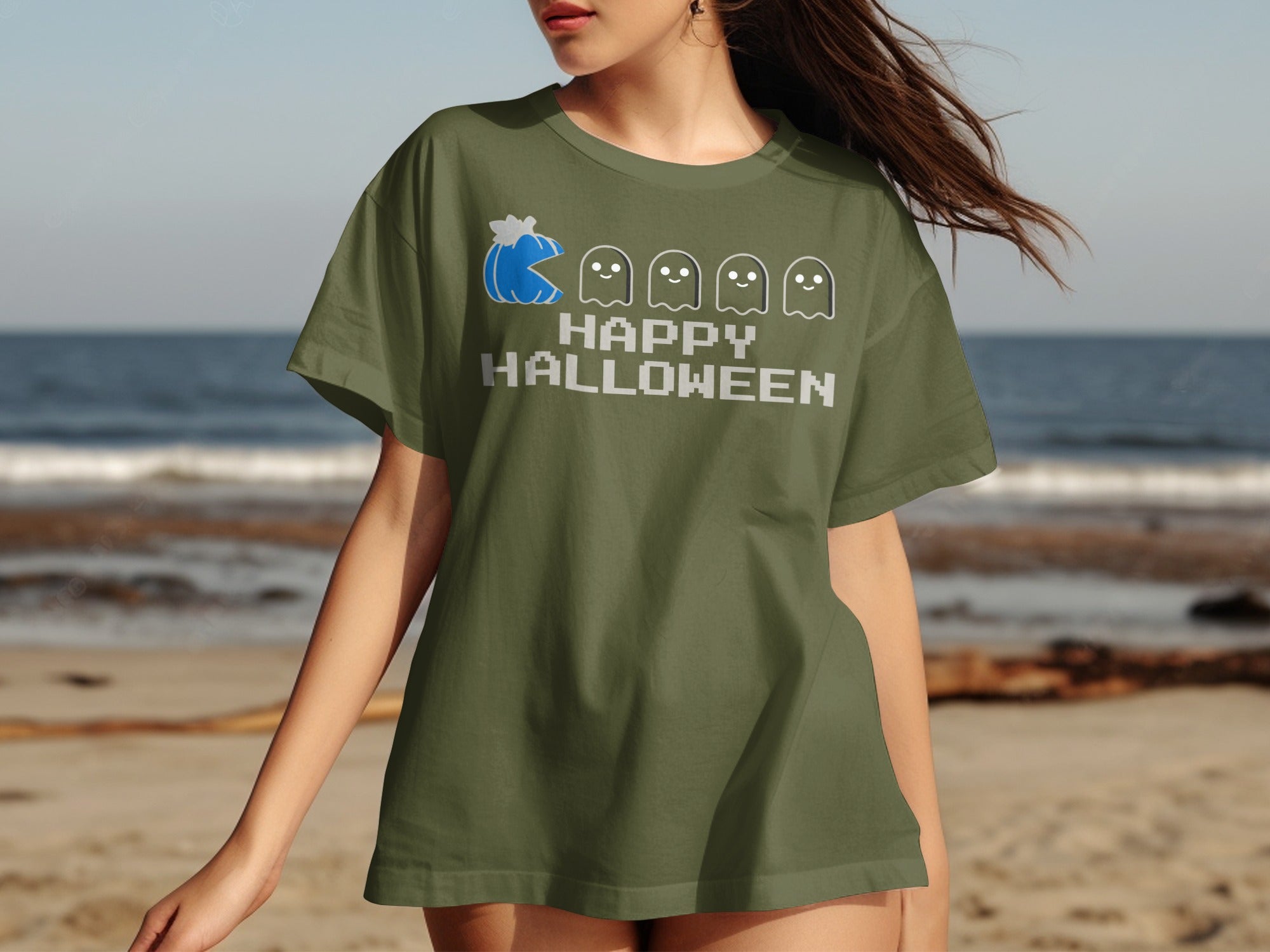Green t-shirt with Pac-Man and ghost graphic that says Happy Halloween.