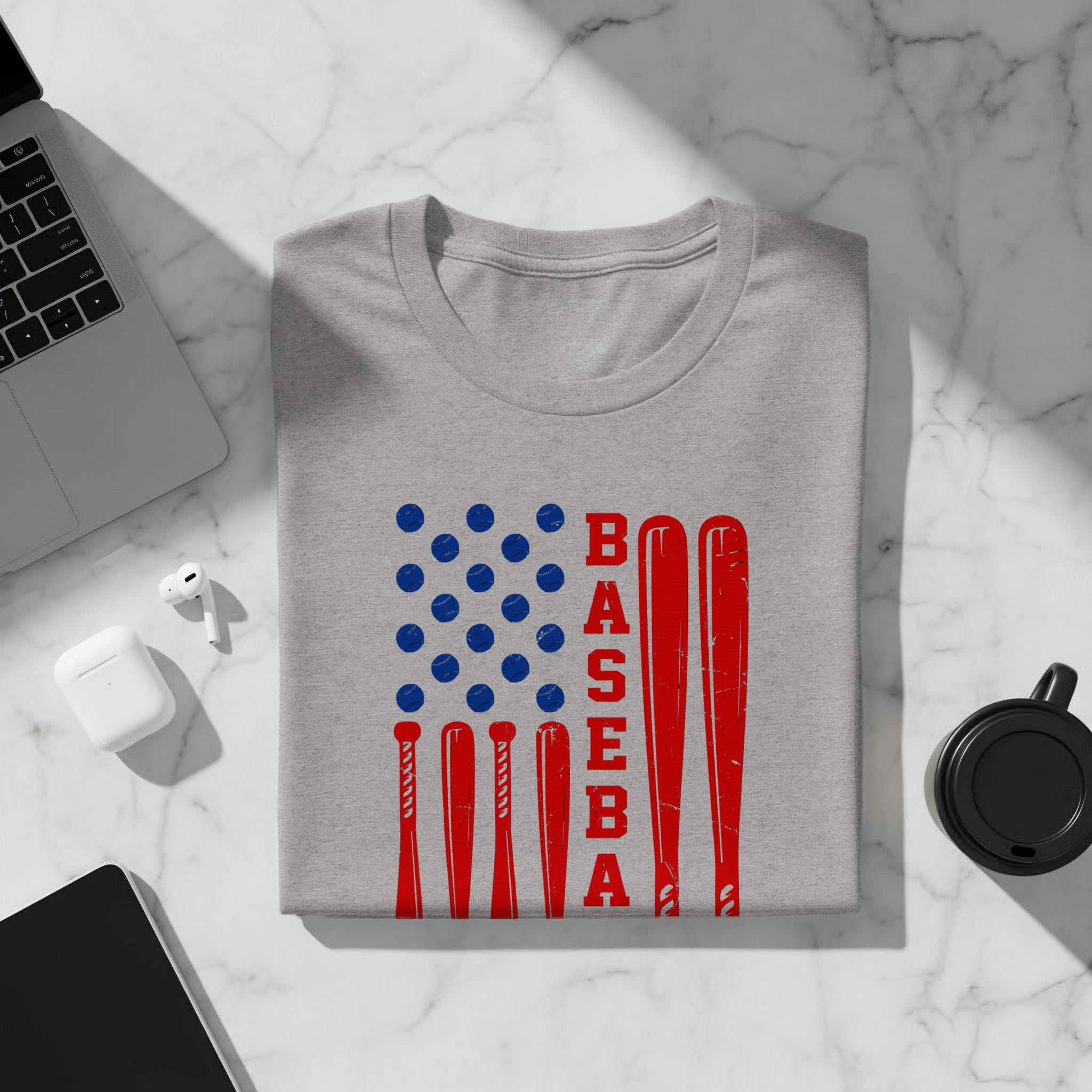 Gray t-shirt with American flag design made of baseball bats and balls.