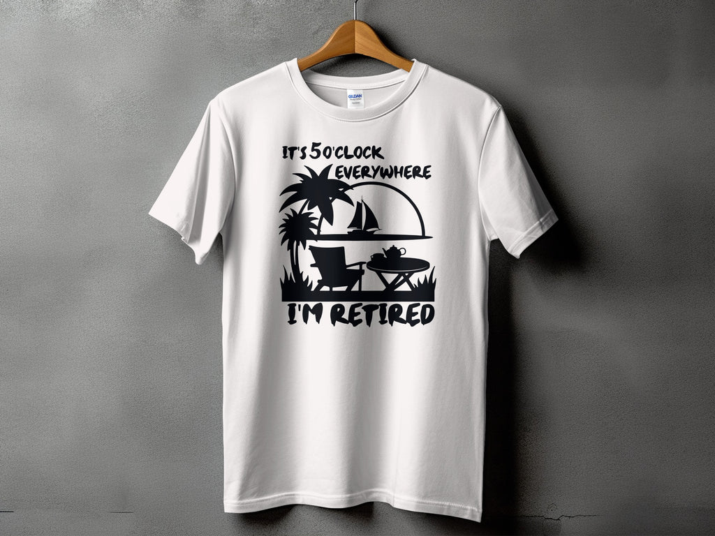 White t-shirt with black graphic: "It's 5 o'clock everywhere, I'm retired."