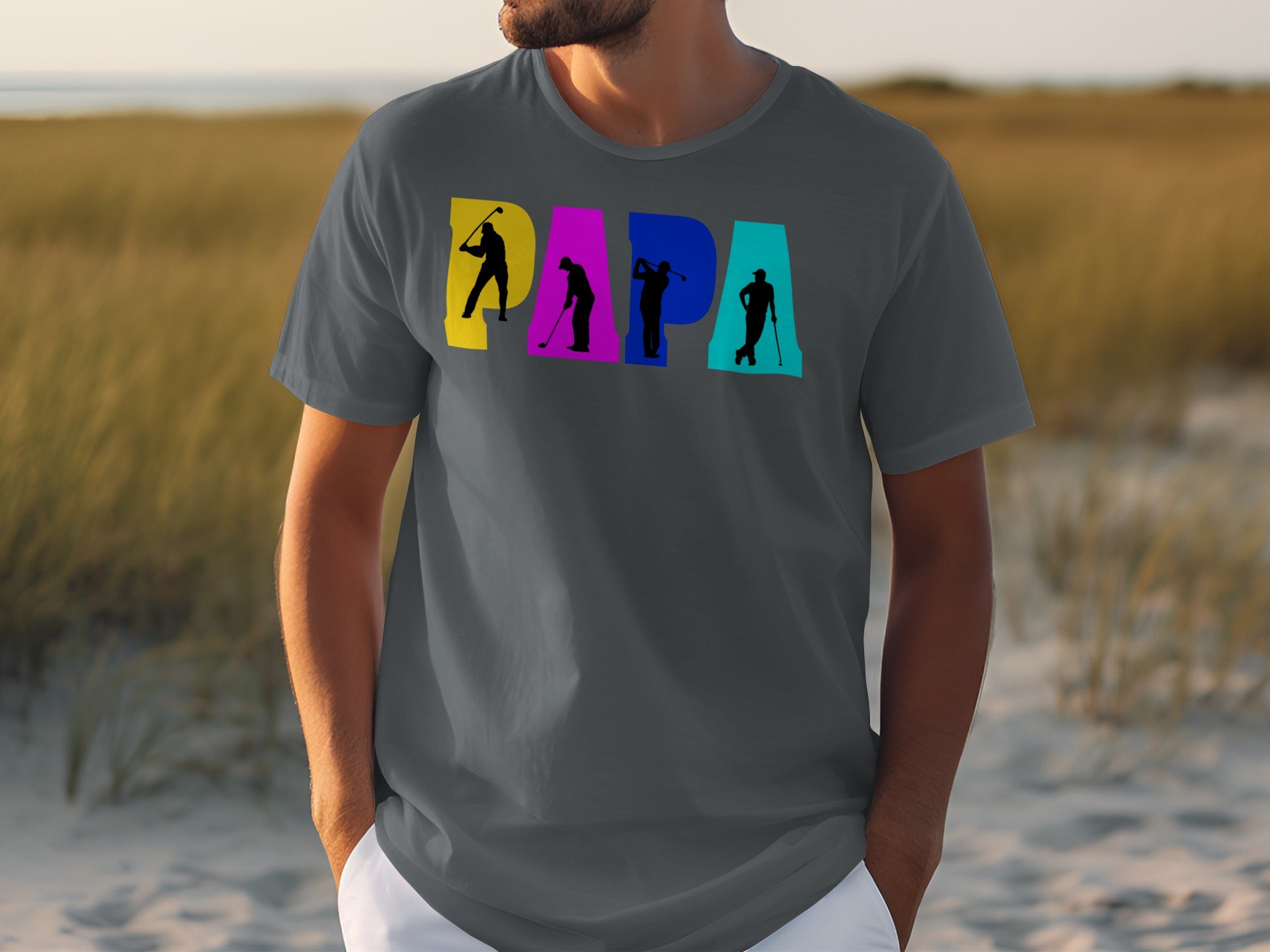 Grey t-shirt with "PAPA" text formed by colorful blocks and golfer silhouettes.