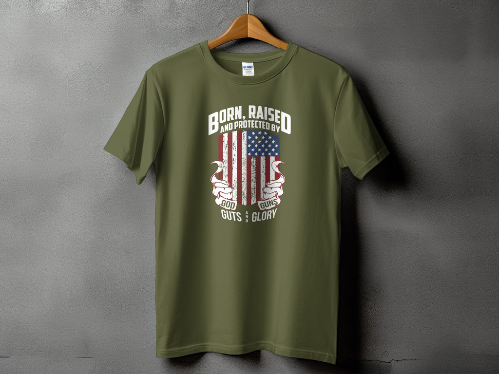 Olive green t-shirt with graphics "Born, Raised and Protected by God, Guns, Guts and Glory."