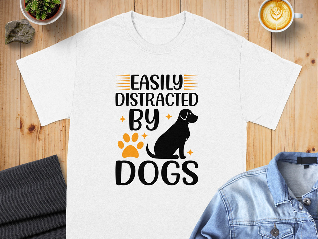White t-shirt with "Easily Distracted By Dogs" text, dog silhouette, and paw print.