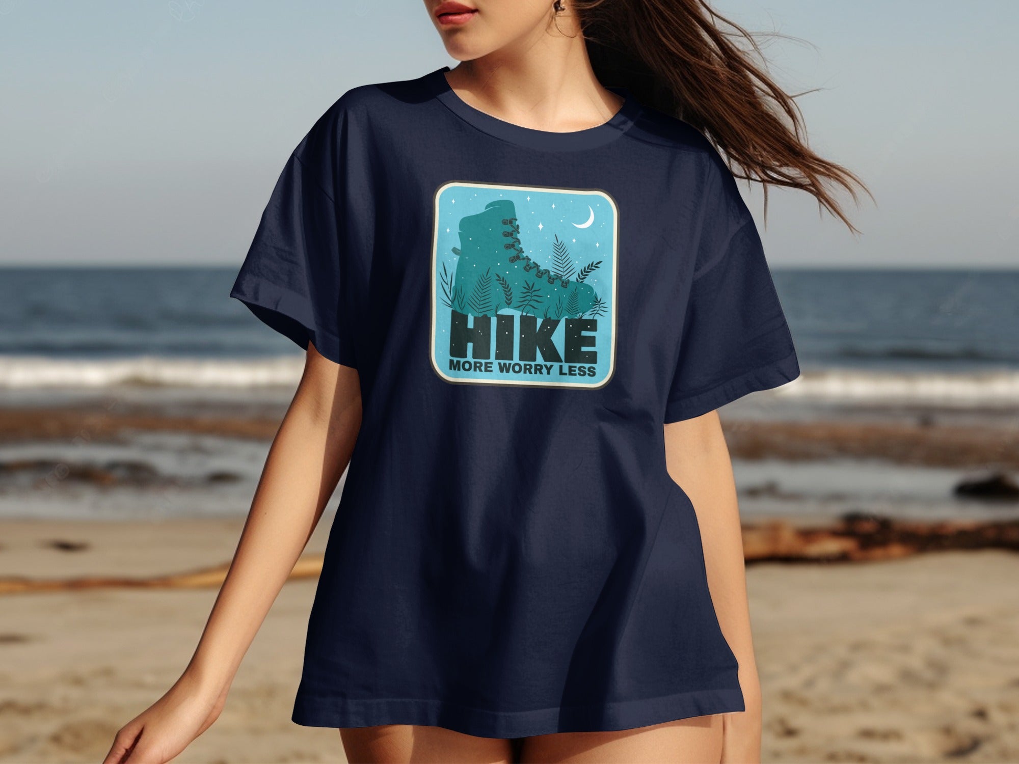 Navy t-shirt featuring a hiking boot graphic with the text "HIKE MORE WORRY LESS".