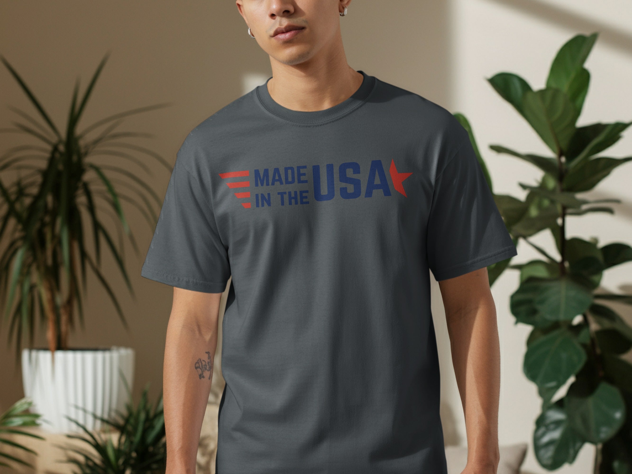 Dark gray t-shirt with "MADE IN THE USA" text and a red star.