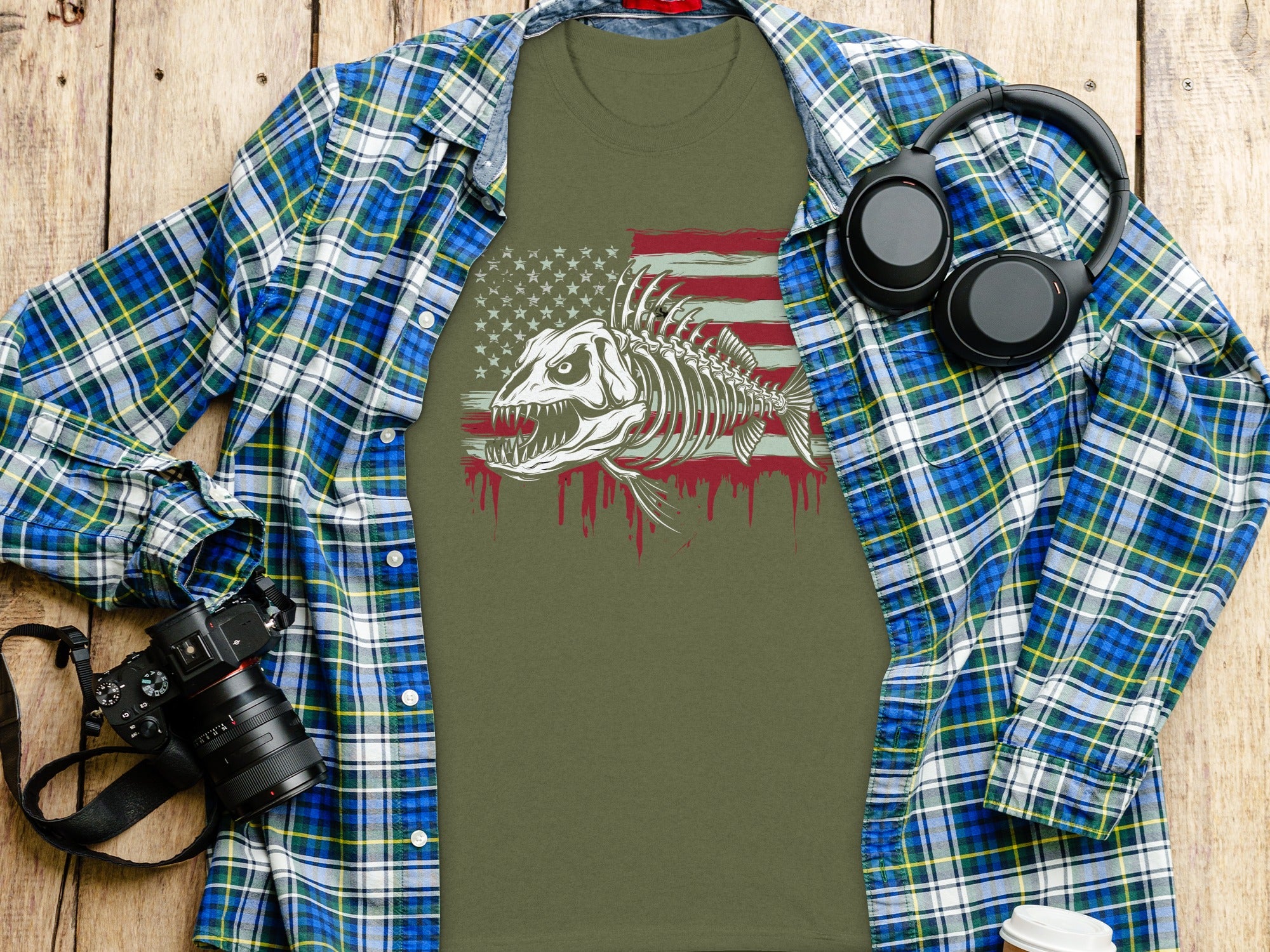 Green t-shirt with distressed American flag and fish skeleton graphic.