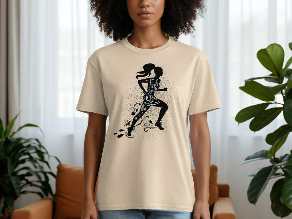 Light yellow t-shirt with a black silhouette of a runner and the words "Find Your Happy Pace".
