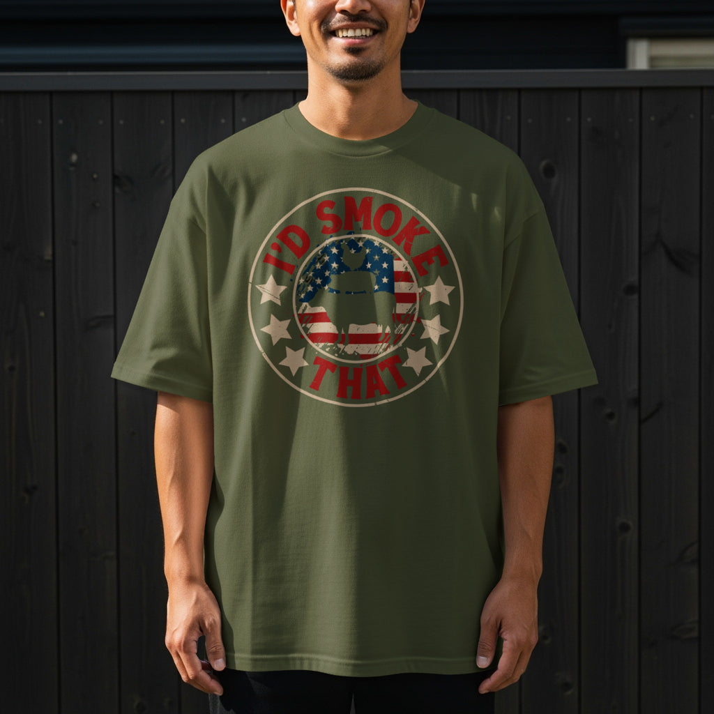 Green t-shirt with circular graphic featuring text "I'd smoke that" and an American flag brisket.