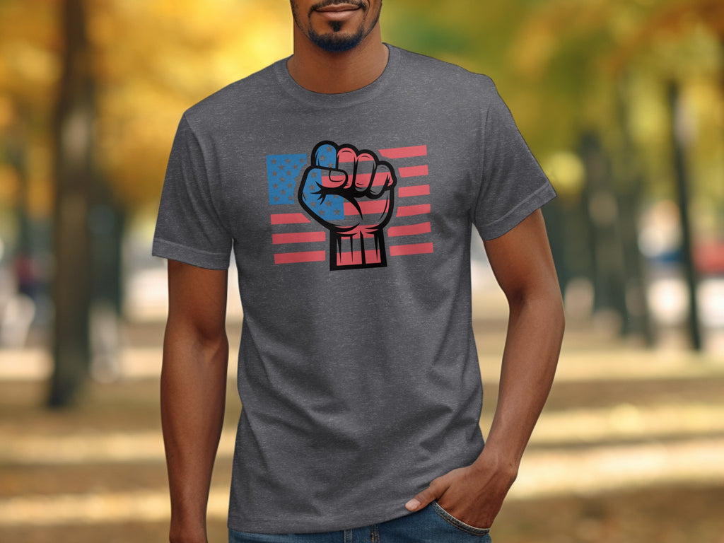 Dark grey t-shirt with a graphic of a clenched fist superimposed on an American flag.