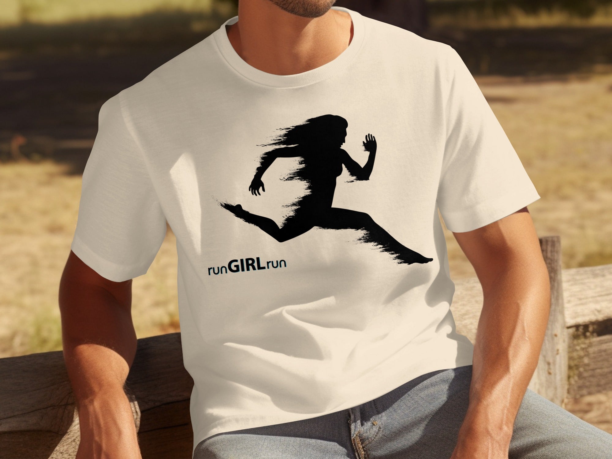 Cream t-shirt with black graphic of a running woman and text "runGIRLrun".