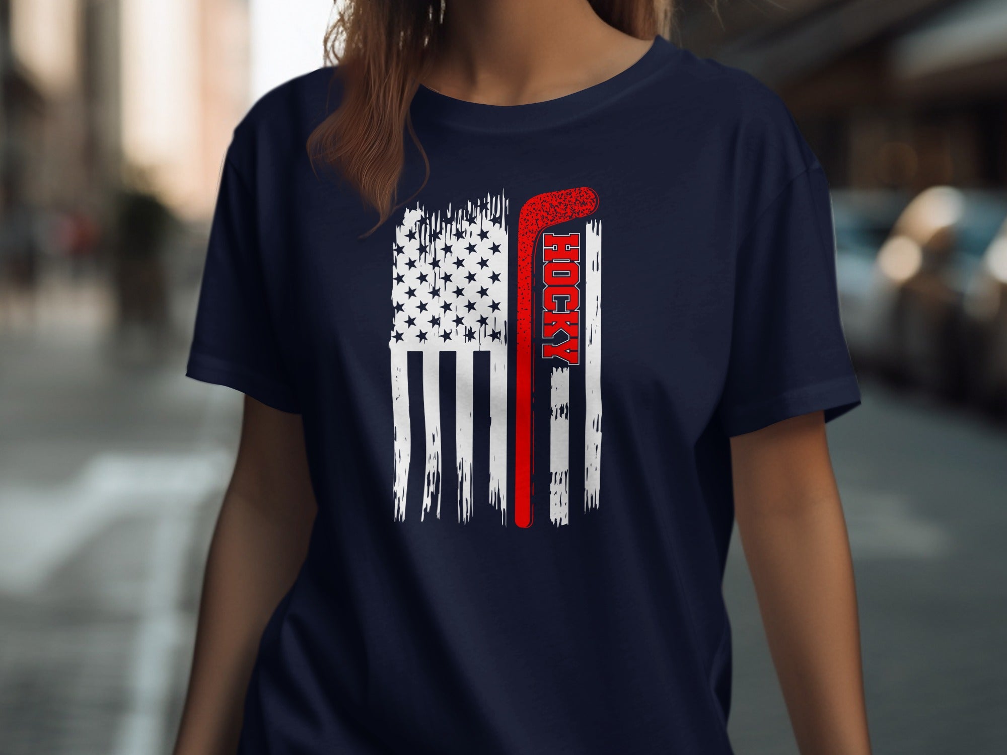 Dark blue t-shirt with distressed American flag and hockey stick graphic.