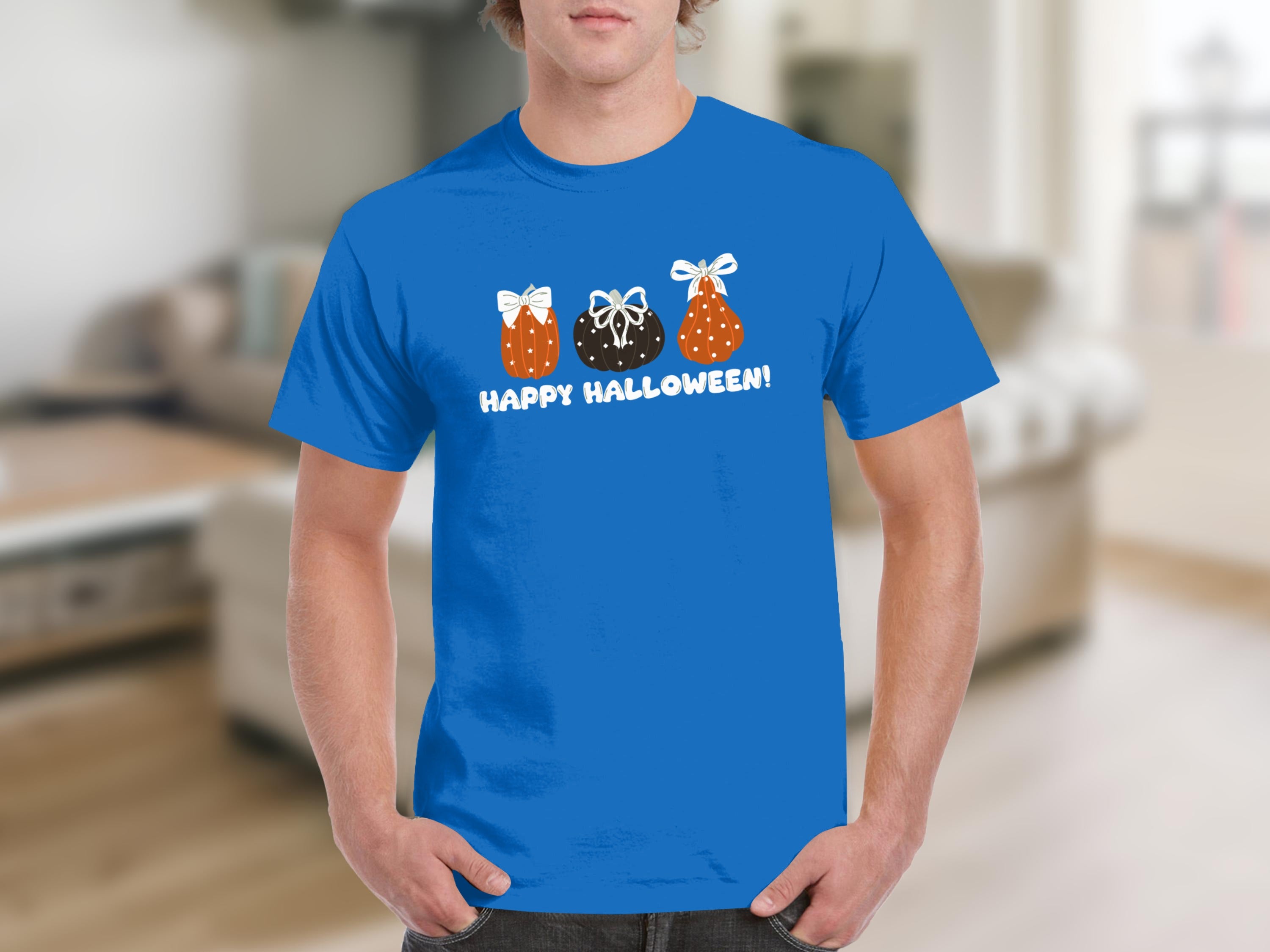 Blue t-shirt featuring three decorated pumpkins and the text "HAPPY HALLOWEEN!".
