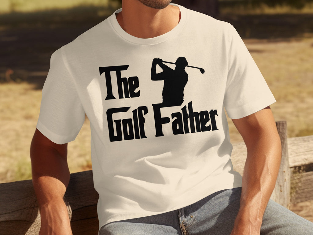Cream t-shirt with black text "The Golf Father" and a golfer silhouette.