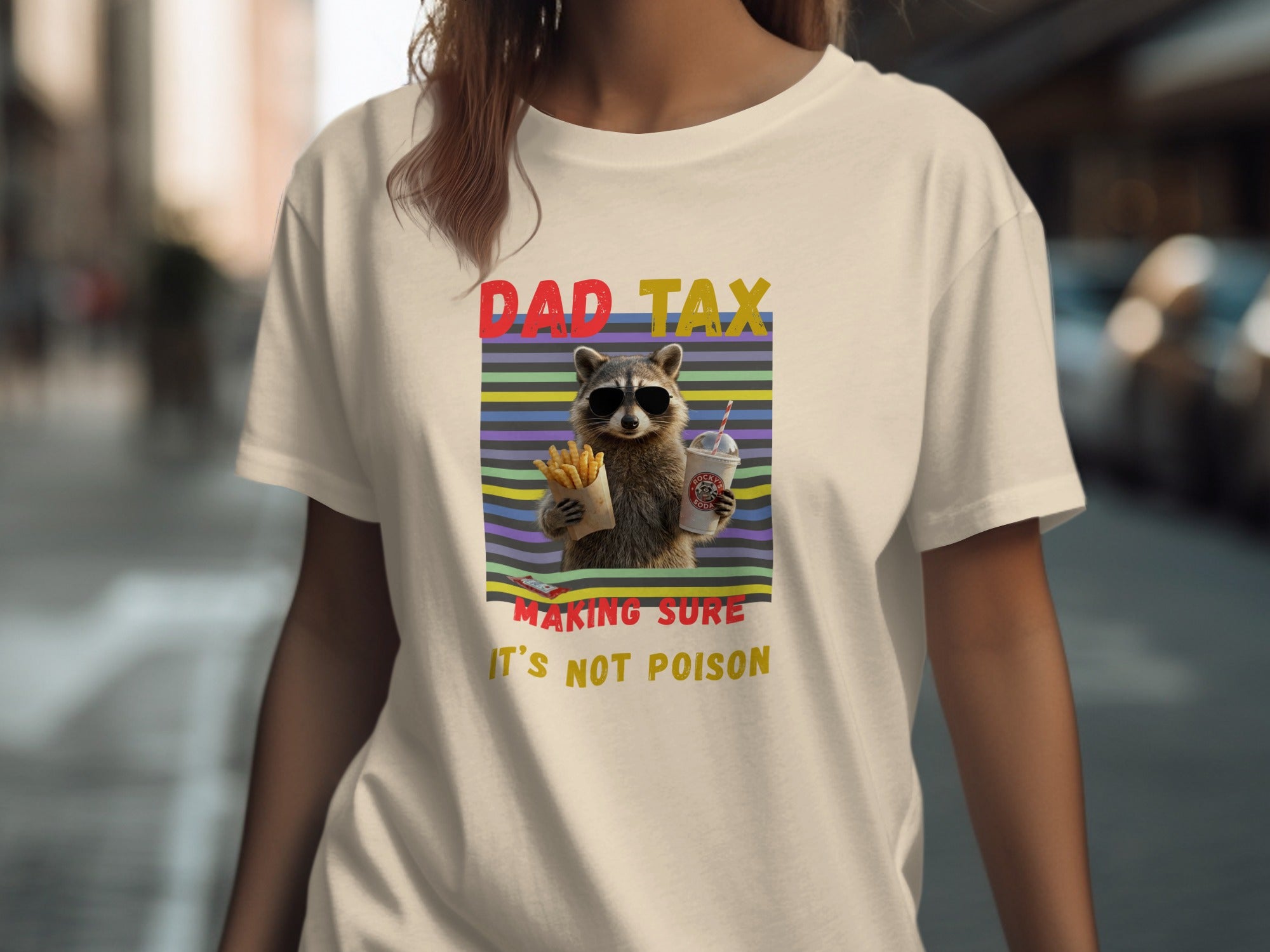 Raccoon wearing sunglasses holding fries and a drink. Text reads "DAD TAX MAKING SURE IT'S NOT POISON."
